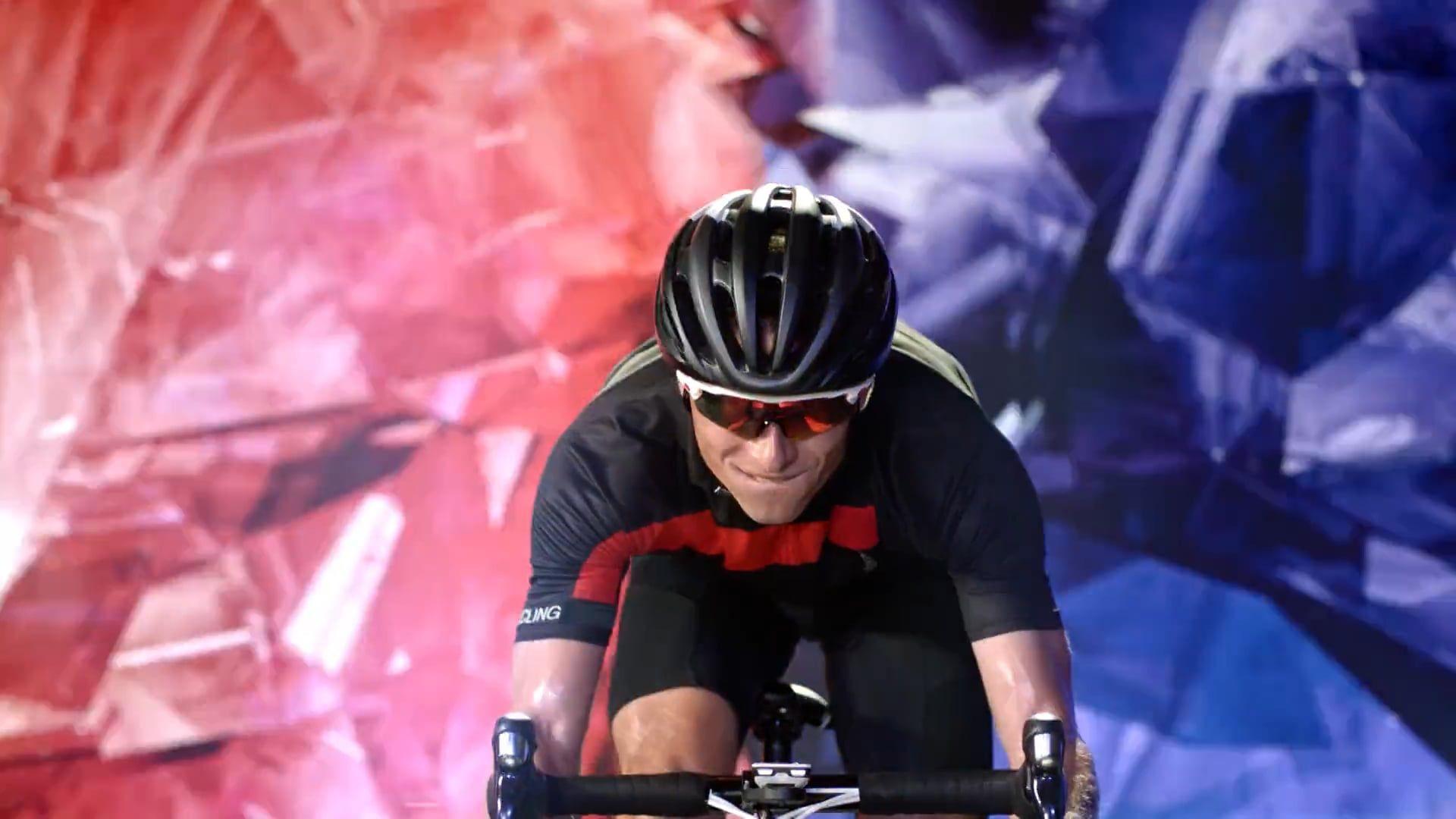 A cyclist in front of a Screenberry-powered digital background during the filming of a European Championship campaign commercial