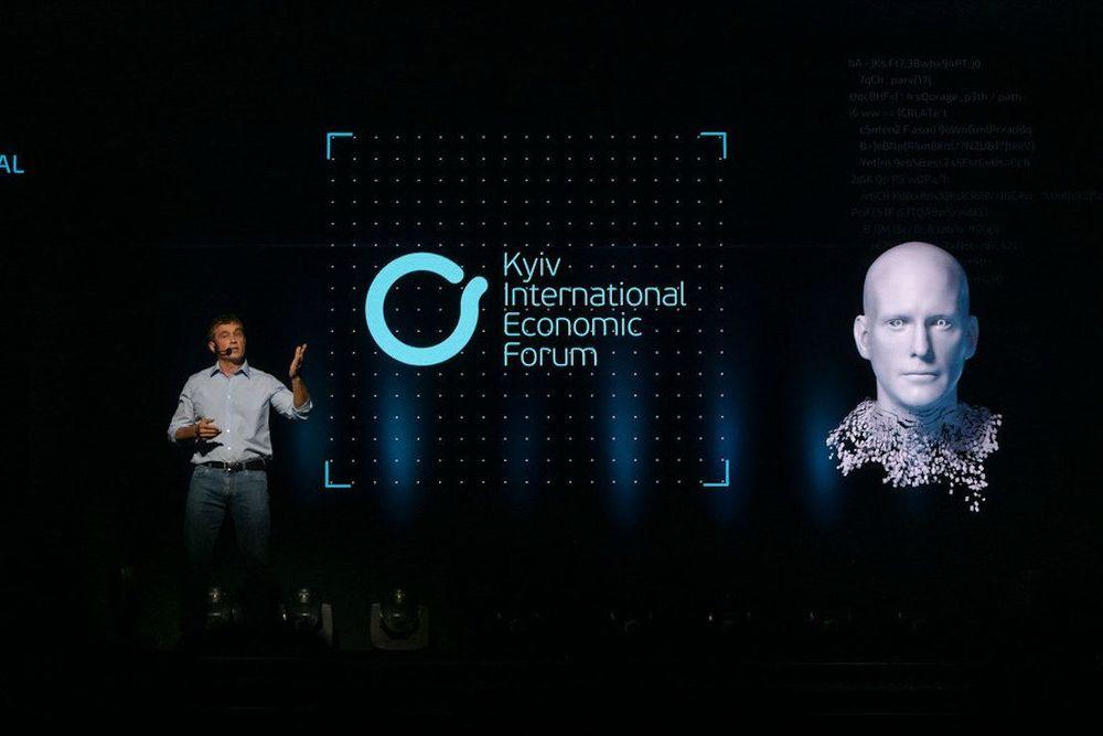 A man standing on stage as part of a live Screenberry-driven holographic presentation at the Kyiv International Economic Forum