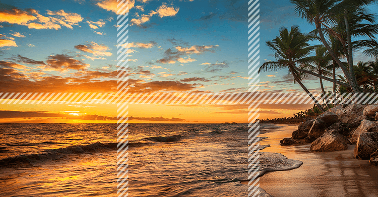 Scene of a beach at sunset on a screen, showcasing Screenberry's seamless edge-blending technology
