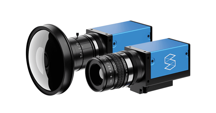 Close-up of two industrial cameras, symbolizing Screenberry's auto-calibration support for single and multi-camera setups