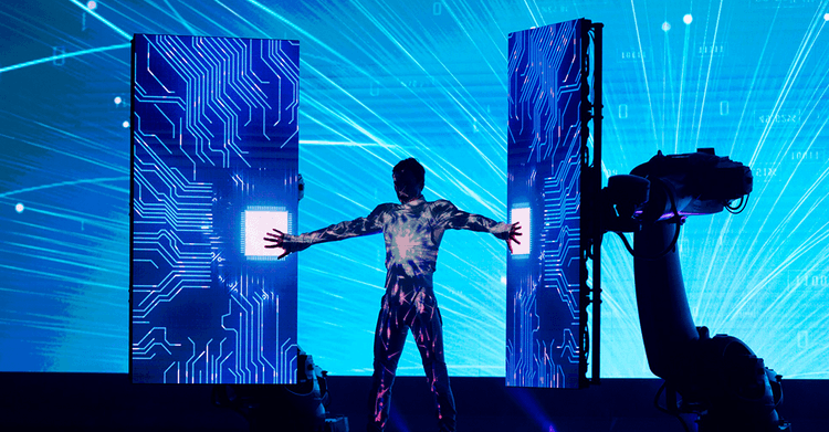 A performer covered with circuit board traces representing Screenberry support for network communication