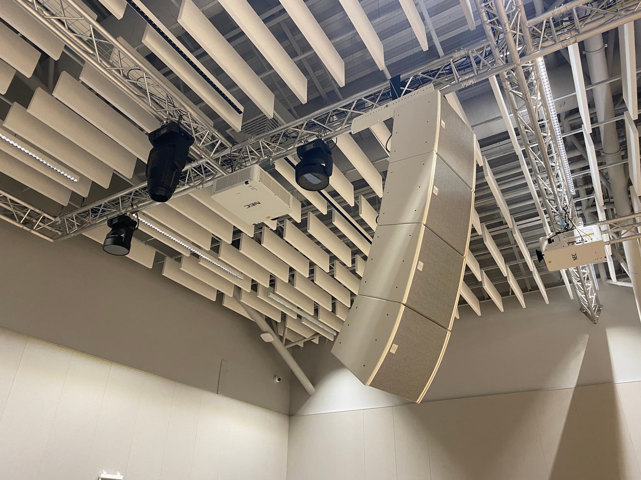 Sound equipment and projectors setup at a Barvy event hall