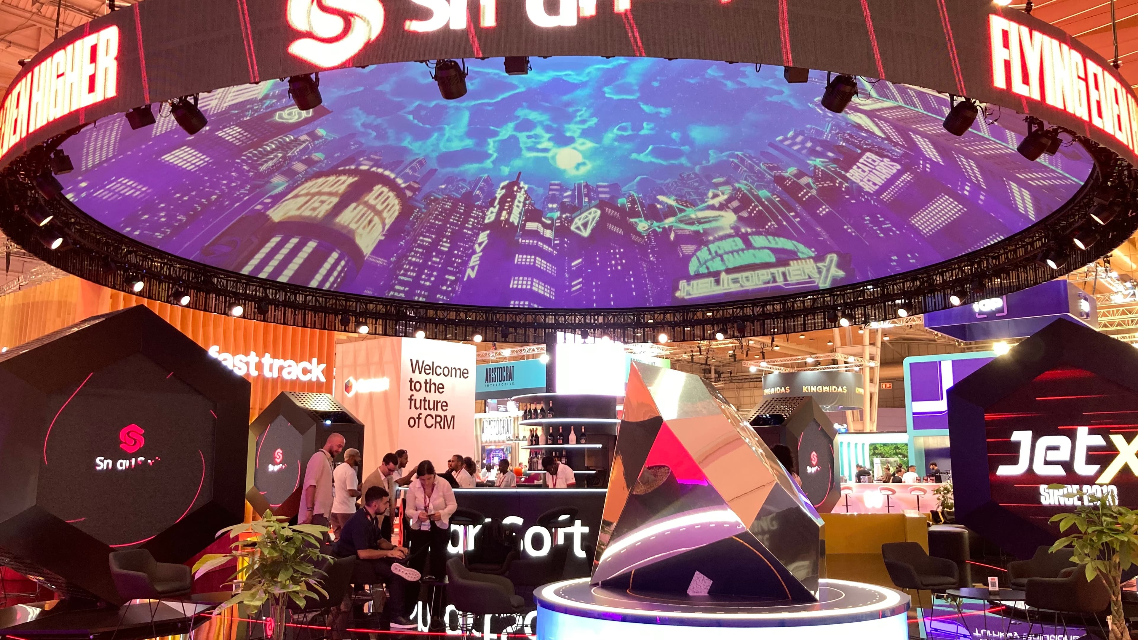 Screenberry-driven projection dome at Smartsoft exhibition booth during SBC Summit 2024